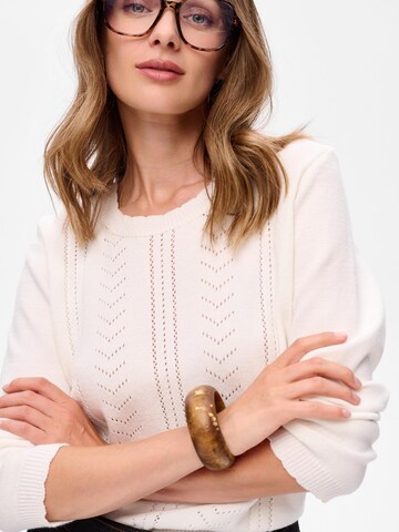 Blue Shadow Sweater in Beige: front