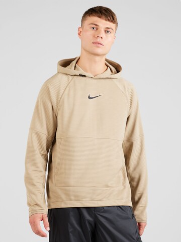 NIKE Sports sweatshirt in Beige: front