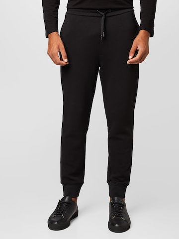 ARMANI EXCHANGE Tapered Trousers in Black: front