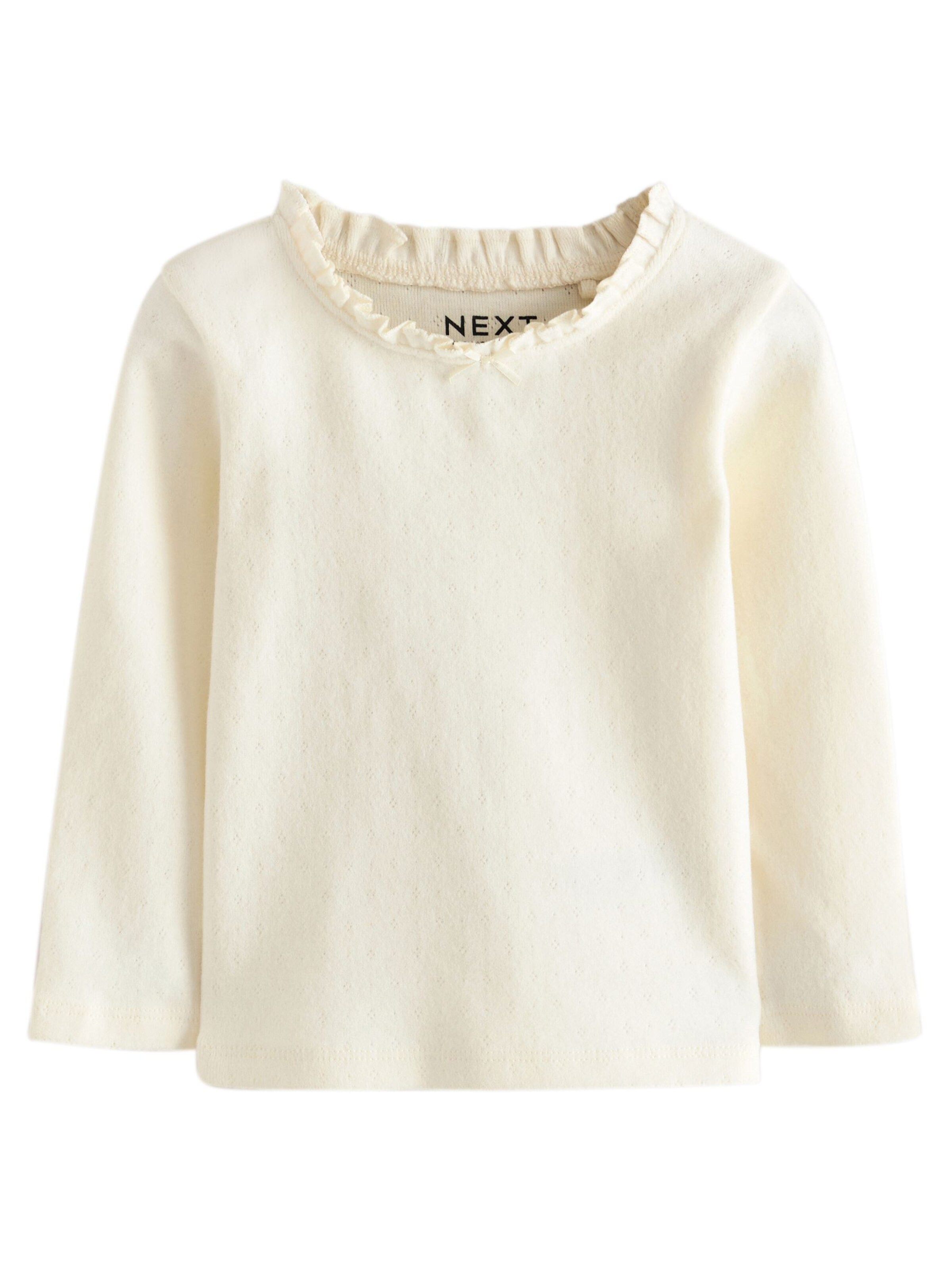 Tricou de la Next pe bej