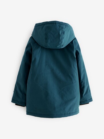 Next - Chaqueta funcional en azul