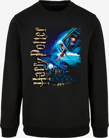 ABSOLUTE CULT Sweatshirt 'Harry Potter - Harry Smiles At Hogwarts' in Schwarz: predná strana