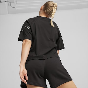 PUMA Functioneel shirt 'Motion' in Zwart