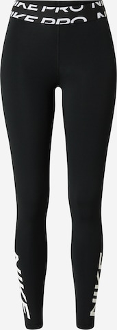 NIKE Skinny Sportbroek in Zwart: voorkant