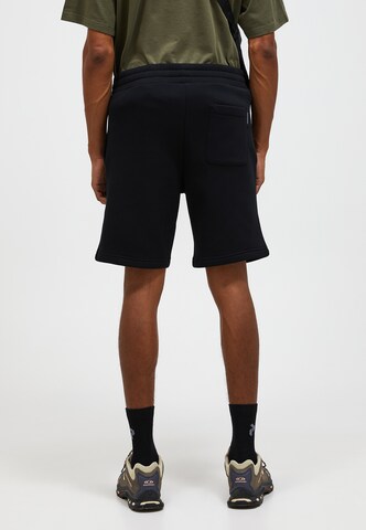 PEAK PERFORMANCE Regular Pants in Black