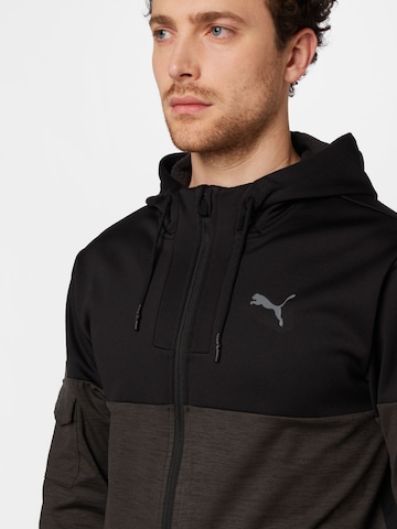 PUMA Sportjacke in Schwarz