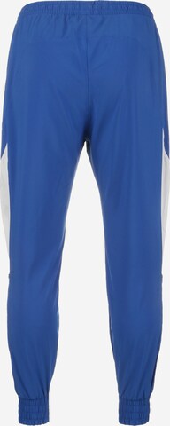 NIKE Tapered Sportbroek in Blauw