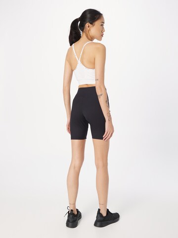 Skinny Pantaloni sportivi di Champion Authentic Athletic Apparel in nero