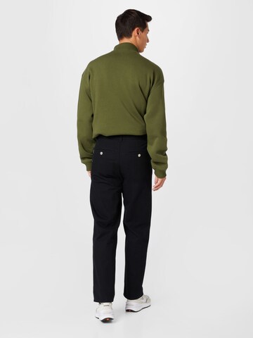 WEEKDAY Regular Trousers with creases 'Joel' in Black