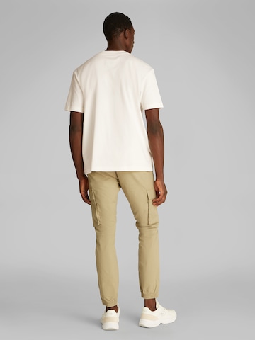 Calvin Klein Jeans Koszulka w kolorze beżowy