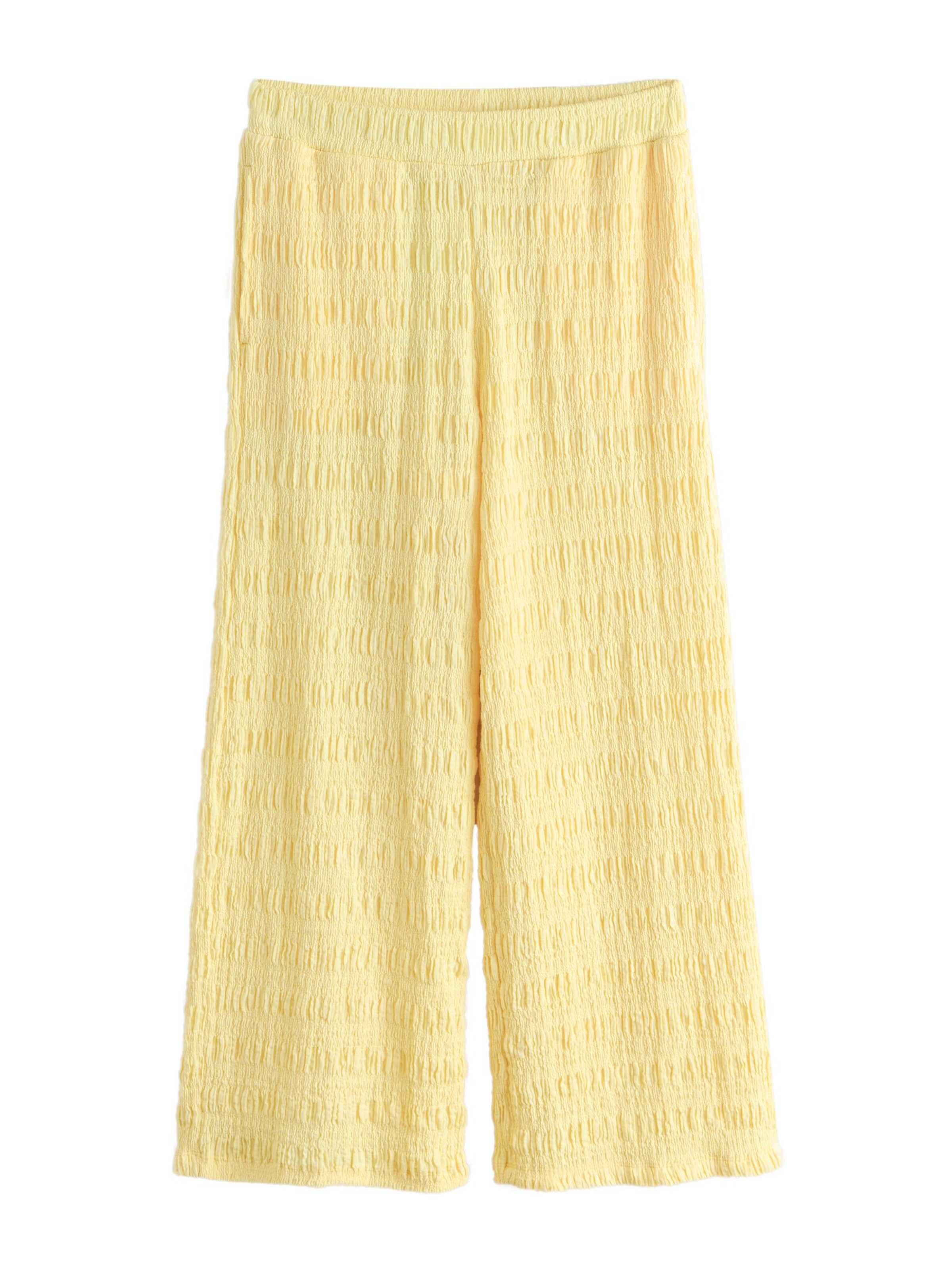 Next Trousers in Yellow: front