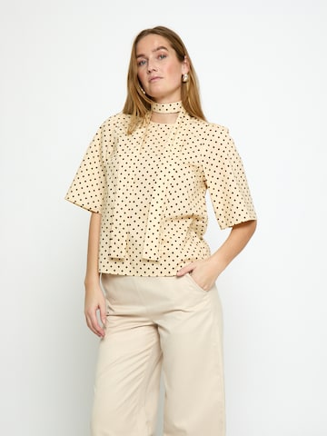Peppercorn Top 'Tyrell' in Geel: voorkant