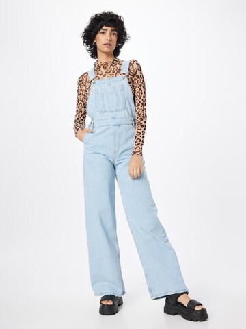 Wide leg Jeans con pettorina di Warehouse in blu: frontale