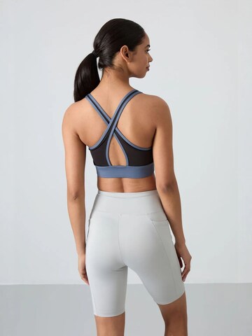 Haut de sport Tommy Life en bleu