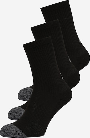 Chaussettes de sport UNDER ARMOUR en noir : devant