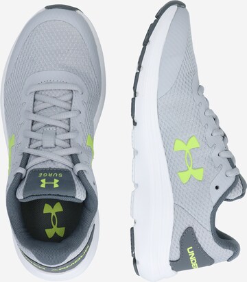 UNDER ARMOUR Sportschuh 'Surge 2' in Grau