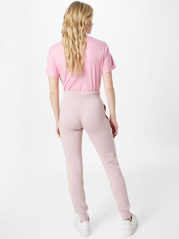 Superdry Zwężany krój Spodnie w kolorze różowy