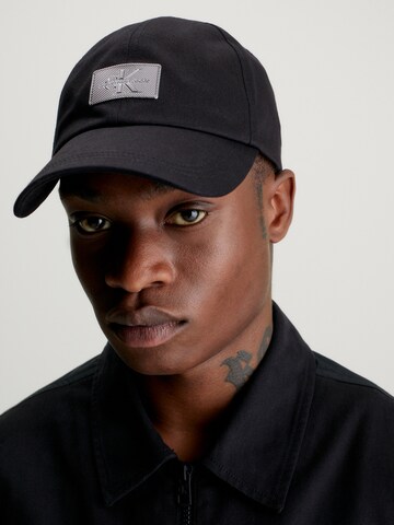 Calvin Klein Jeans Cap in Black: front