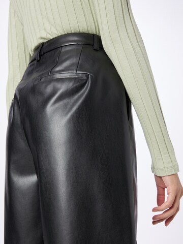 Karo Kauer Loose fit Pleat-Front Pants in Black