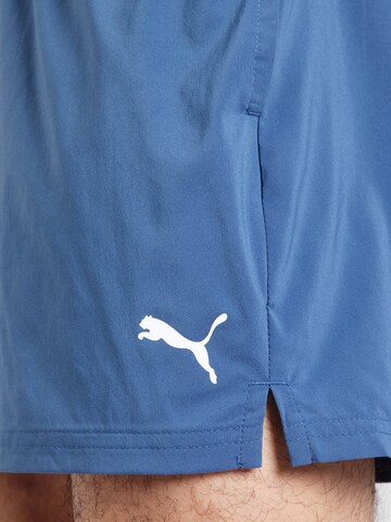 PUMA Regularen Športne hlače 'Tad Essentials' | modra barva