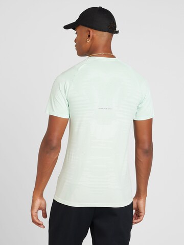 Maglia funzionale di ASICS in verde