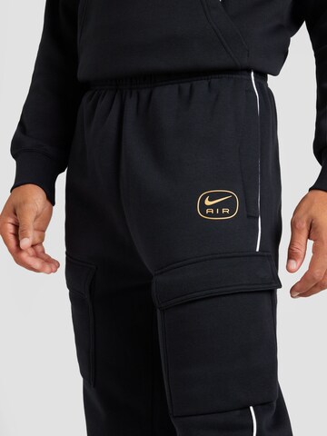 Nike Sportswear Zwężany krój Bojówki 'AIR' w kolorze czarny