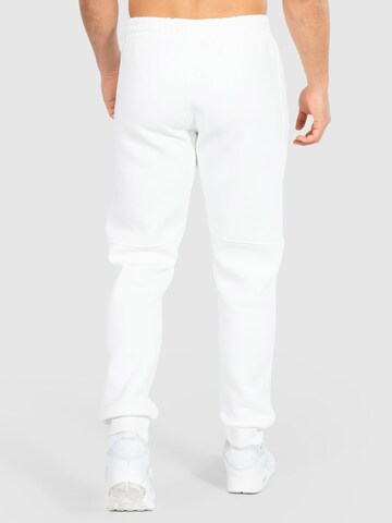 Effilé Pantalon de sport 'Athlete' Smilodox en blanc