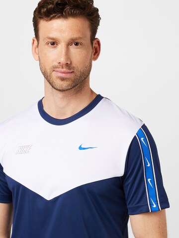 T-Shirt 'REPEAT' Nike Sportswear en bleu