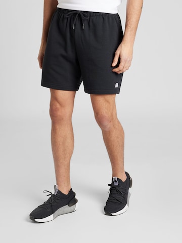 new balance Regular Trousers in Black: front