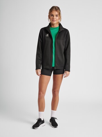Veste de survêtement 'CORE XK' Hummel en noir