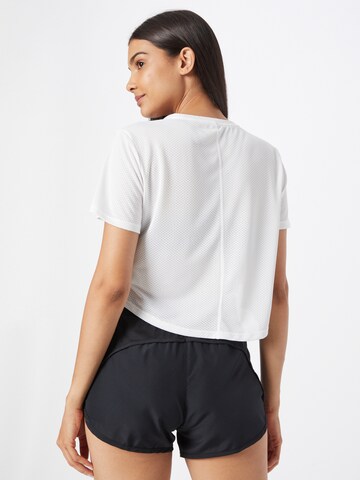 T-shirt fonctionnel 'One' NIKE en blanc