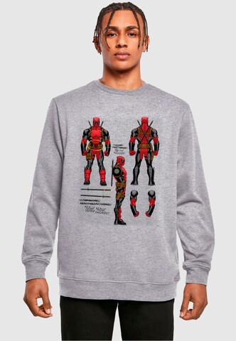 ABSOLUTE CULT Sweatshirt 'Deadpool - Action Figure Plans' in Grijs: voorkant