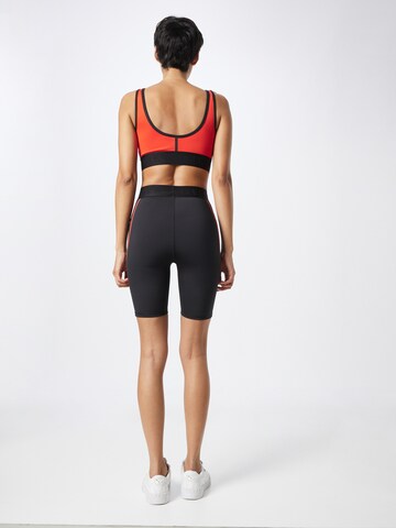 Skinny Pantalon de sport 'x Vogue Collection' PUMA en noir