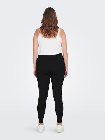 ONLY Carmakoma Skinny Leggingsit 'Tay' värissä musta