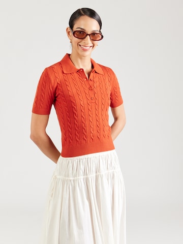 Mavi - Jersey en rojo: frente