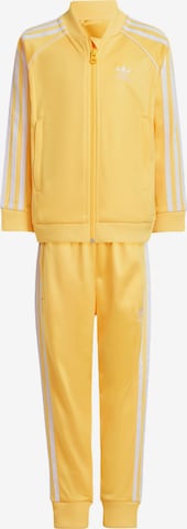 ADIDAS ORIGINALS - Fato de jogging 'Adicolor' em amarelo: frente