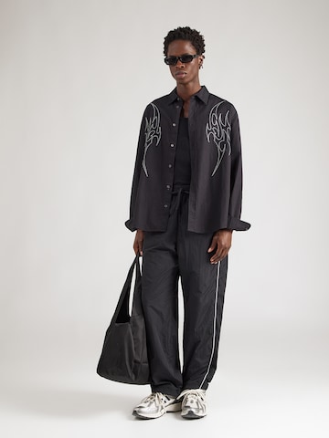 Wide leg Pantaloni de la HOLLISTER pe negru