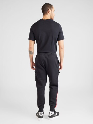 Effilé Pantalon cargo 'AIR' Nike Sportswear en noir