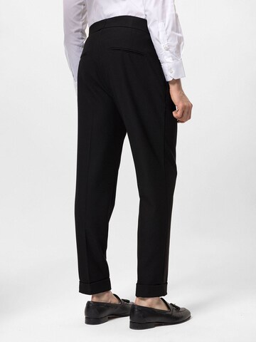Antioch Tapered Pleat-front trousers in Black