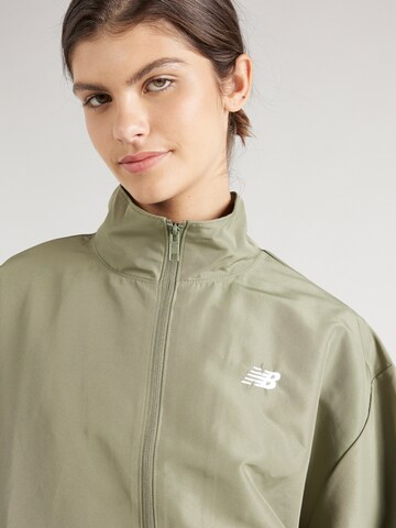 new balance - Chaqueta de entretiempo en verde