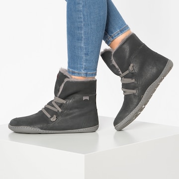 CAMPER Lace-Up Ankle Boots in Black: front