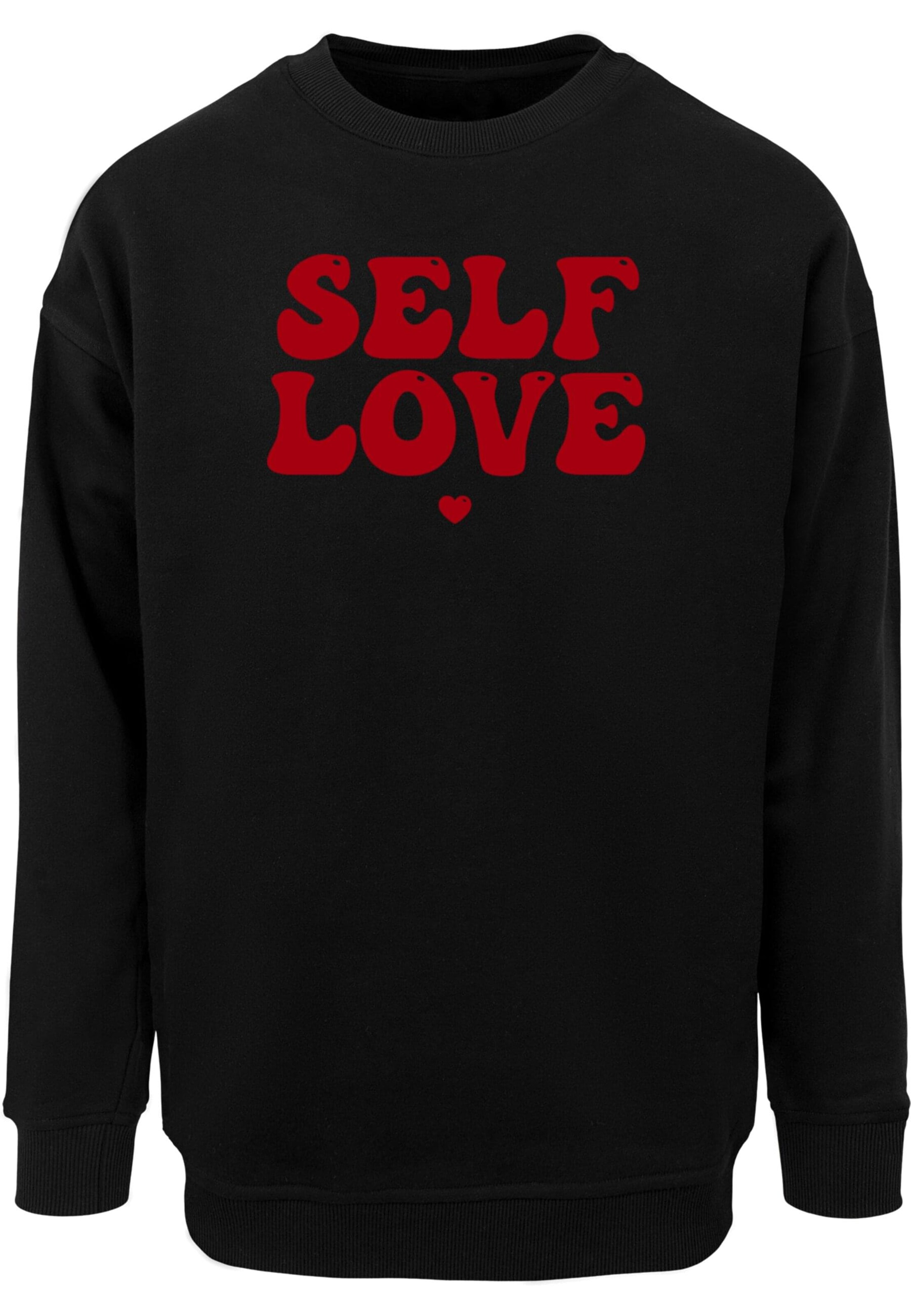 Sweat-shirt 'Self Love' Merchcode en noir : devant