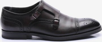 BOSS Black Flats & Loafers in 42 in Brown: front