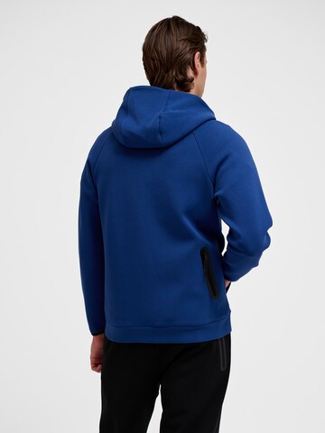 Veste de survêtement 'Tech Fleece' Hummel en bleu