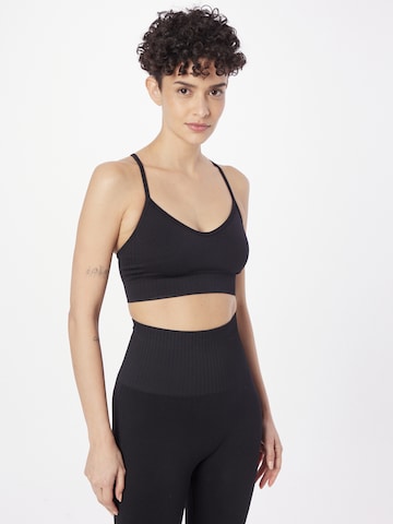 Casall Bralette Workout Pants in Black: front