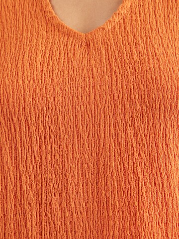 Haut 'Fleur' ABOUT YOU en orange