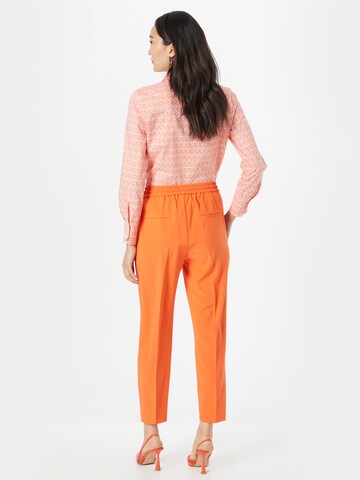 InWear - Tapered Pantalón de pinzas 'Adian' en naranja