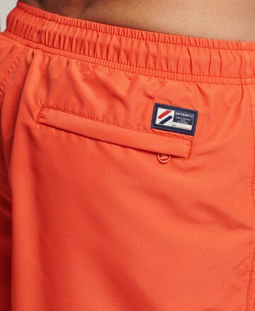 Shorts de bain Superdry en orange