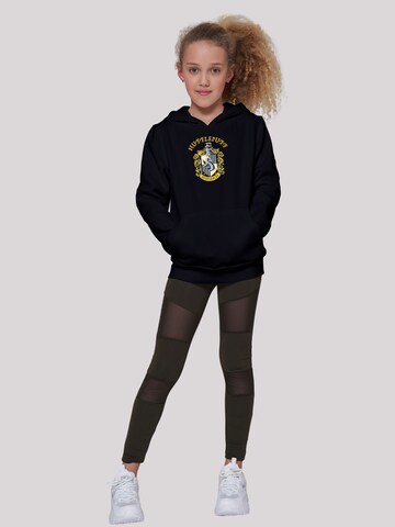 F4NT4STIC Sweatshirt 'Harry Potter Hufflepuff Crest' in Schwarz
