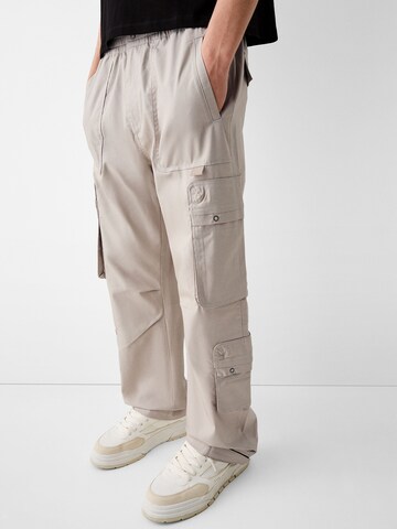 Bershka Loose fit Cargo Pants in Beige